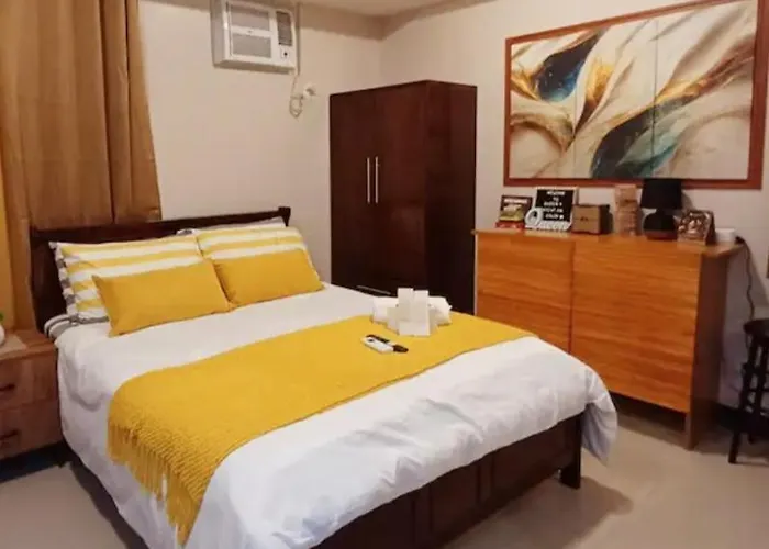 Queen V Staycation Tower D Apartahotel Manila